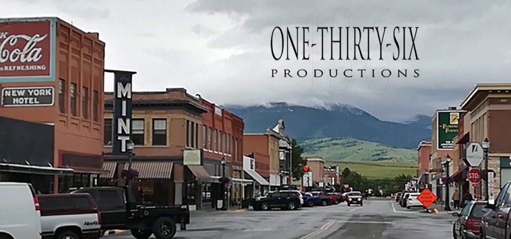 Town with One Thirty Six Productions logo in sky